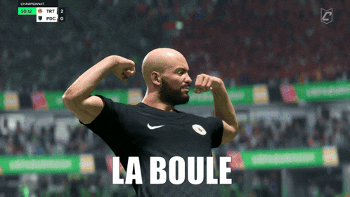a man flexes his muscles while wearing a black nike shirt that says la boule on it