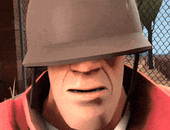 a close up of a man wearing a helmet on his head