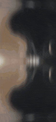 a blurry picture of a person 's face with a few lines visible