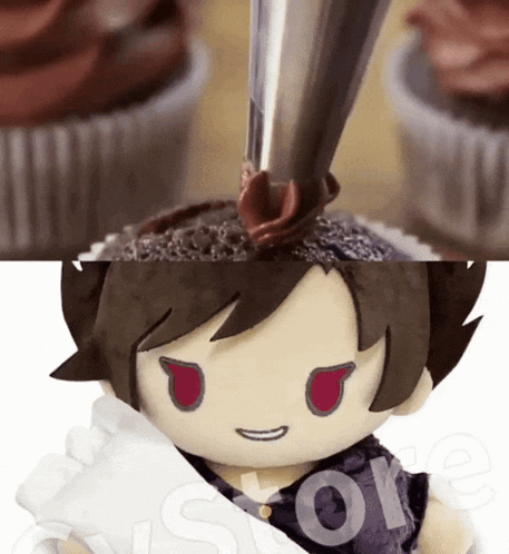 a stuffed character with red eyes is being decorated with chocolate frosting