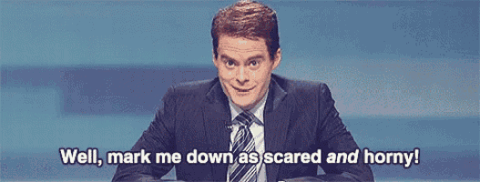 a man in a suit and tie is saying well mark me down as scared and horny !