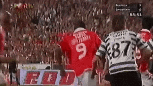 a soccer player wearing a jersey with the number 9