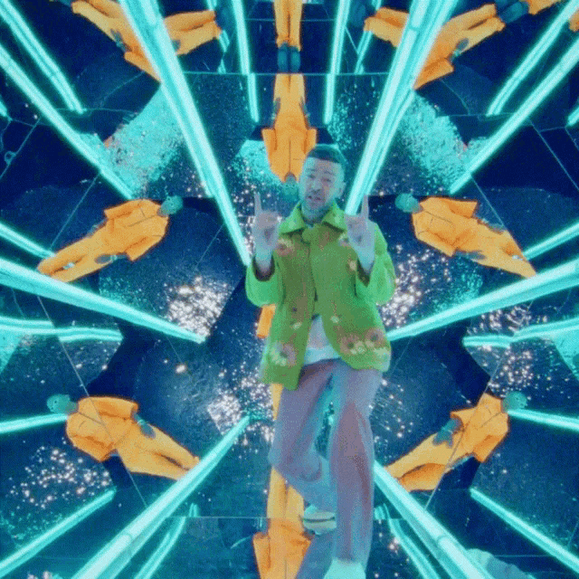 a man in a green jacket is standing in a kaleidoscope
