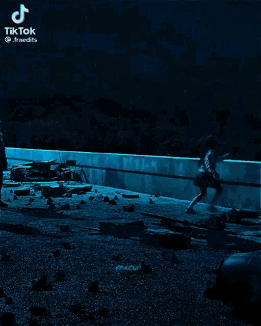 a girl is doing a handstand on a balance beam in the water .