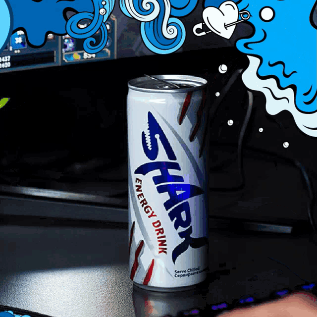 a can of shark energy drink is sitting on a table