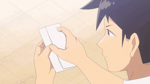 a cartoon of a man holding a piece of paper with chinese writing on the bottom