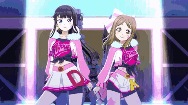 two anime girls are standing next to each other and one has a letter d on her skirt