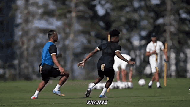 a group of soccer players are playing on a field and one of them is wearing a number 82 jersey