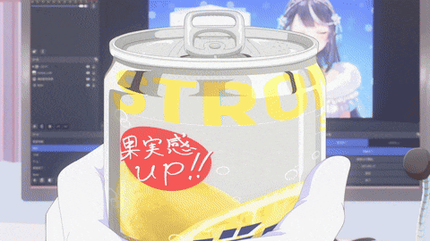 a person is holding a can of strow in front of a computer monitor