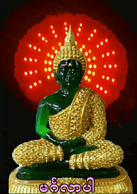 a green and gold statue of a buddha with a red background and a foreign language written on it