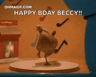 a chicken is standing on a table with a microphone in its beak and says `` happy bday becky '' .