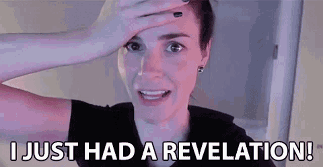 a woman is covering her forehead with her hand and says `` i just had a revelation ! ''