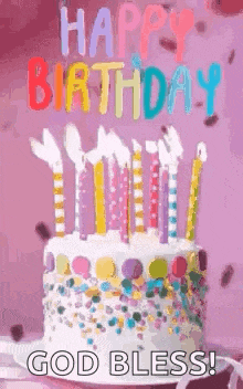 a birthday cake with candles on it and the words `` happy birthday god bless ! ''