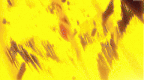 a close up of a man 's face with a sword in his hand