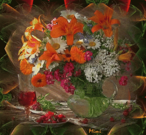 a bouquet of flowers in a vase with the name mimi on the bottom