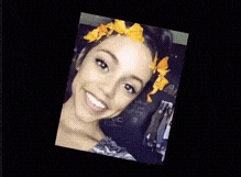 a picture of a woman with a flower in her hair is upside down