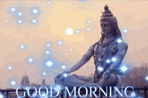a statue of lord shiva sits in a lotus position with the words good morning written below him