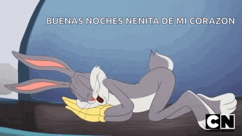 bugs bunny is sleeping on a pillow with the words buenas noches nenita de mi corazon written above him