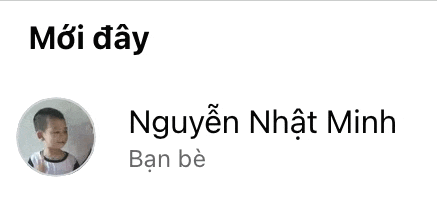a picture of a young boy in a circle with the name nguyễn nhật minh written below it .
