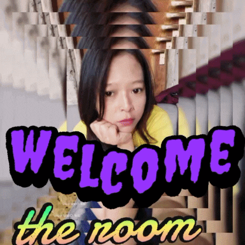 a woman is sitting on a couch with the words welcome the room above her