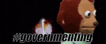 a monkey is standing in front of a fountain with the words governmenting written on it