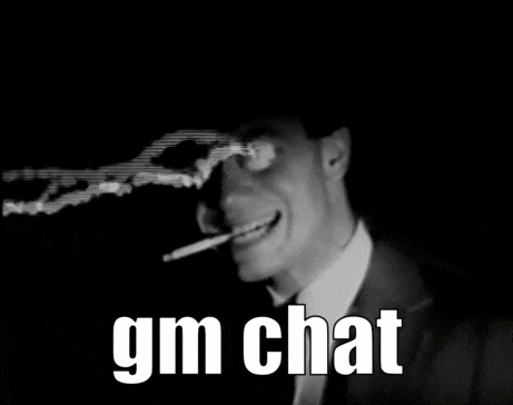 a man in a suit and tie is smoking a cigarette with the words gm chat below him