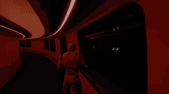 a robot is looking out a window in a futuristic hallway
