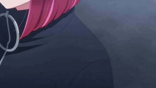 a woman with pink nails is being comforted by another woman