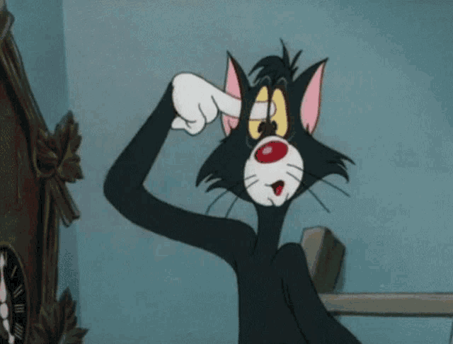 a cartoon cat with a red nose is pointing at something