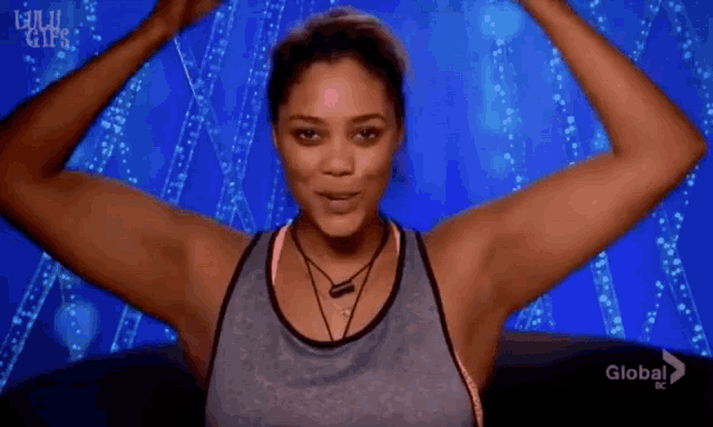 a woman with her hands on her head is on a screen that says global bc