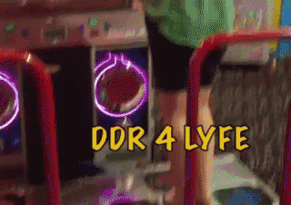 a person playing a video game with the words ddr 4 lyfe in yellow letters
