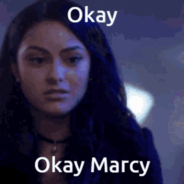 a close up of a woman 's face with the words okay okay marcy above her