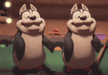 two husky penguins are holding hands on a pool table