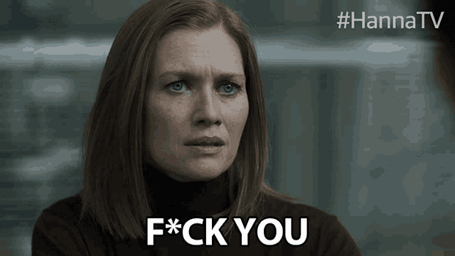 a close up of a woman 's face with the words f * ck you below her