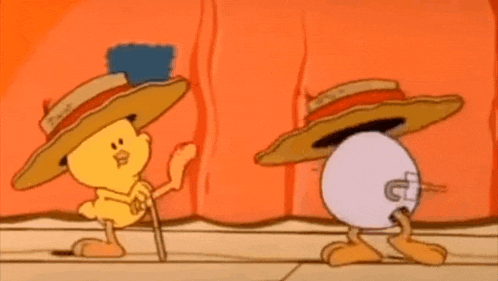 two cartoon characters , a chicken and an egg , are standing next to each other wearing hats .