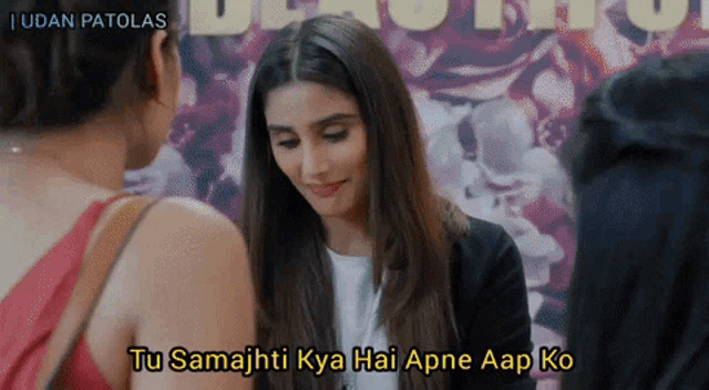 a woman talking to another woman with the caption tu samajhti kya hai apne aap ko on the bottom