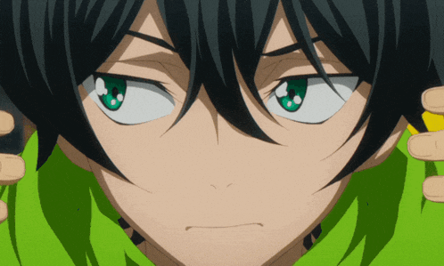 a close up of a person with green eyes