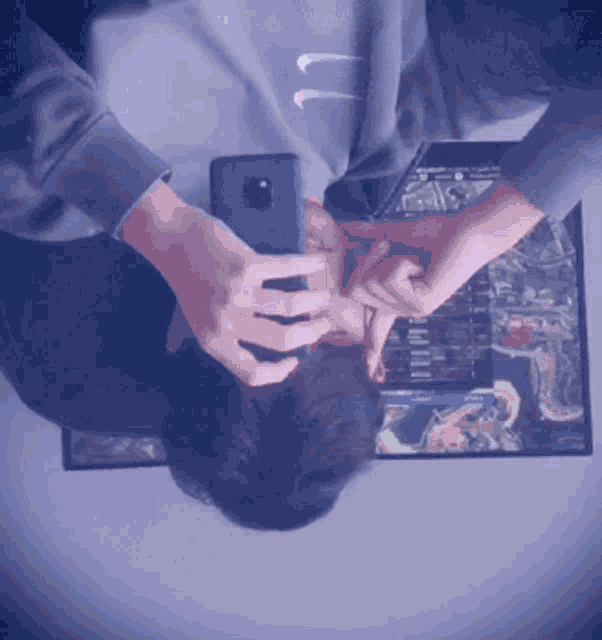 a person is taking a selfie with a cell phone