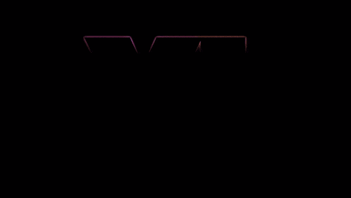 a purple and orange letter vi is lit up in the dark