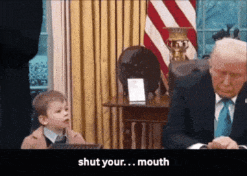 a little boy sitting next to a man in a suit and tie with the words shut your mouth on the bottom