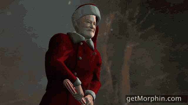 a man in a santa suit is holding a candy cane with the website getmorphin.com below him
