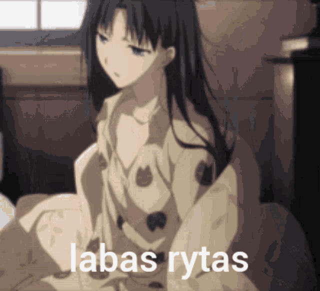 a picture of a girl with the words " labas rytas " on the bottom right
