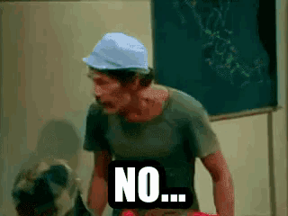 a man wearing a hard hat and a t-shirt says no