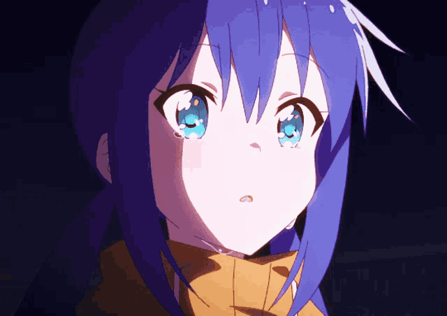 a close up of a girl 's face with blue hair