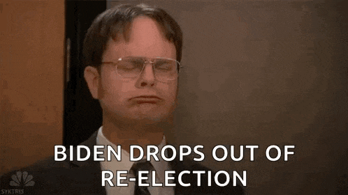 a man in a suit and tie is holding his arms up in the air and saying biden drops out of re-election .