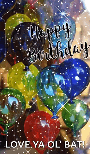 a bunch of colorful balloons with the words `` happy birthday love ya ol ' bat '' written on them .