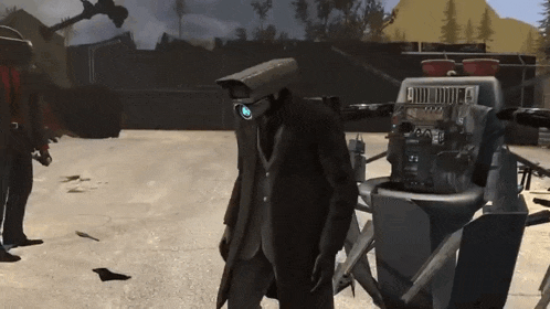 a man with a camera on his head stands next to a machine