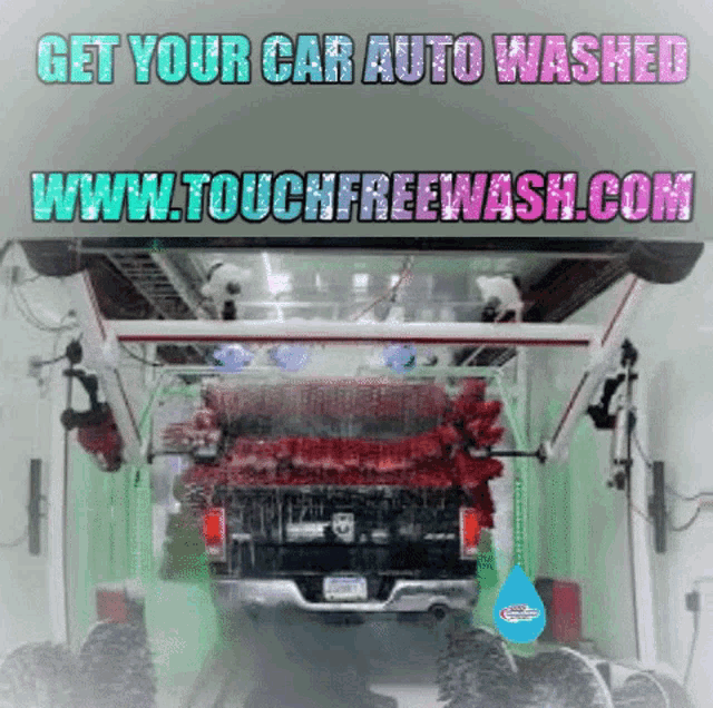 a truck is being washed at an auto wash