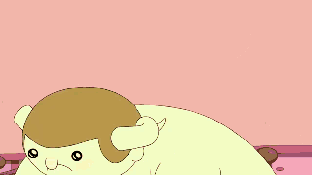 a cartoon character with horns is holding a yellow ball in his hands