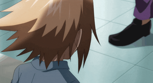 a close up of a person 's hair with a person standing behind them